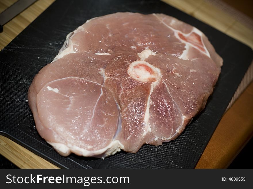 Closeup of piece of uncooked meat. Closeup of piece of uncooked meat.