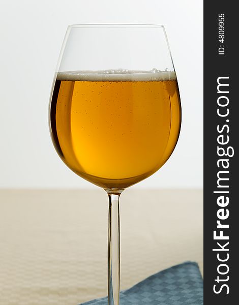 Beer glass ( lager ) on the kitchen table