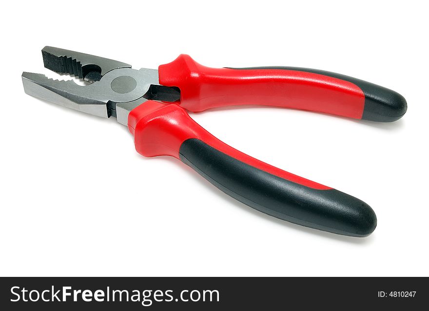 Red pliers isolated over a white background