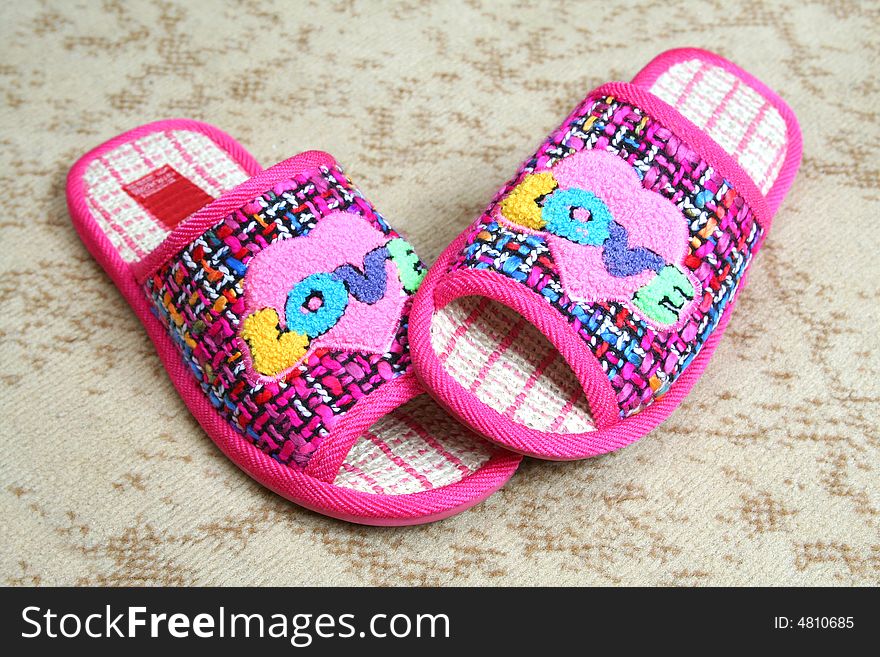 Multi-coloured slippers with heart