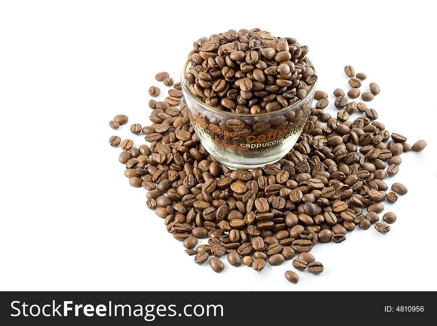 Coffee beans in a cup isolated on a white background
