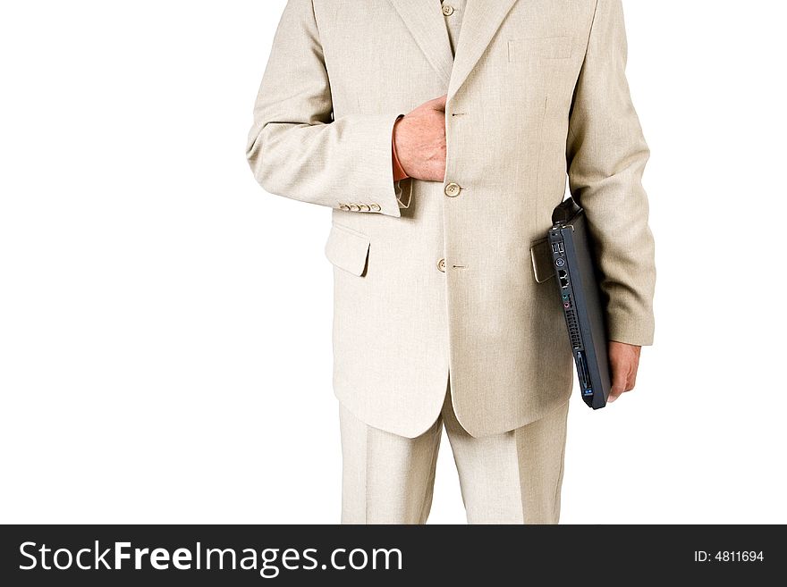 A business man in a white suit holding a laptop