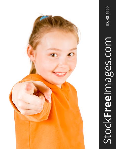 Young girl pointing with a white background