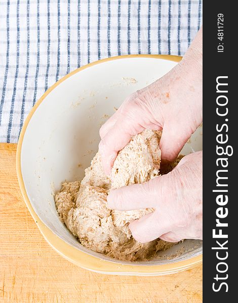 Hands Mixing Dough