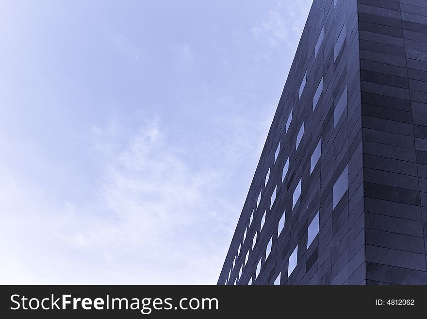 Abstract building over blue sky. Blue toned, copy spaced. Abstract building over blue sky. Blue toned, copy spaced.