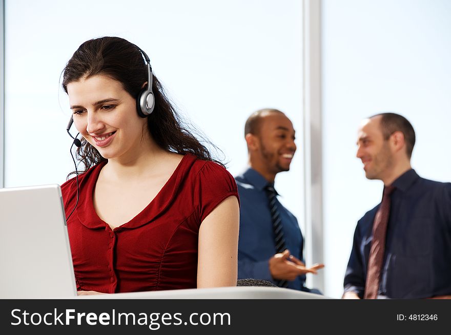 Business team with a woman in the foreground