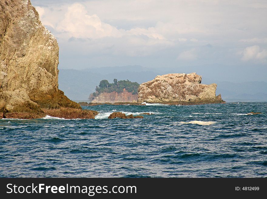 View of the Pacific ocean and rocks on the coast of Costa Rica. View of the Pacific ocean and rocks on the coast of Costa Rica