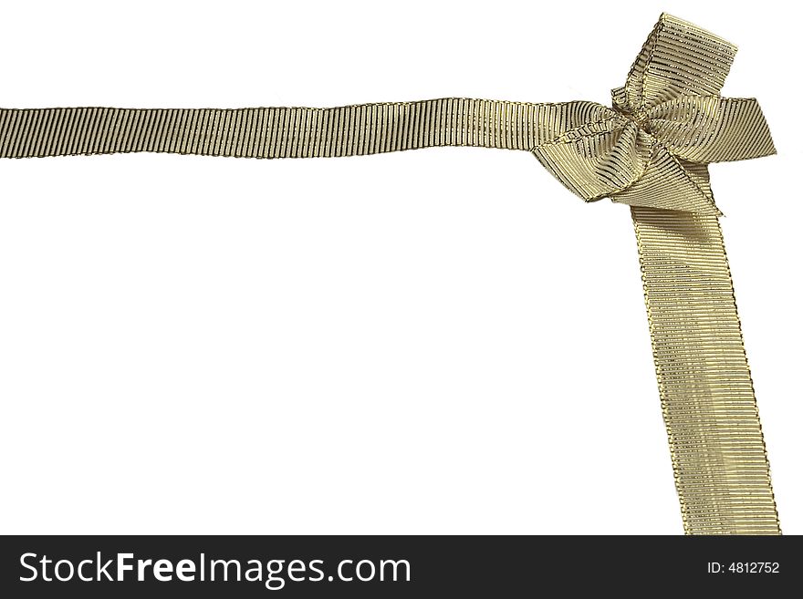 Golden ribbon and bow isolated over white background