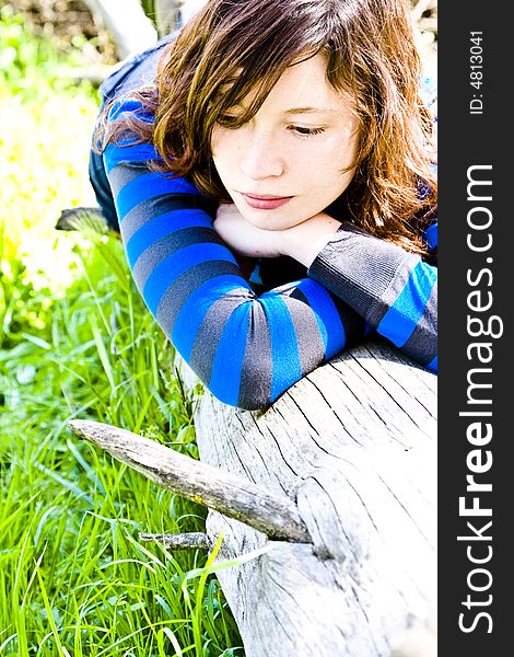 Young woman on trunk