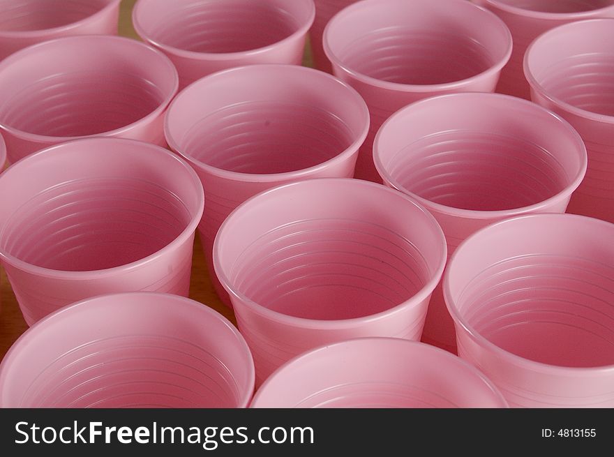 A lot of pink plastic cups