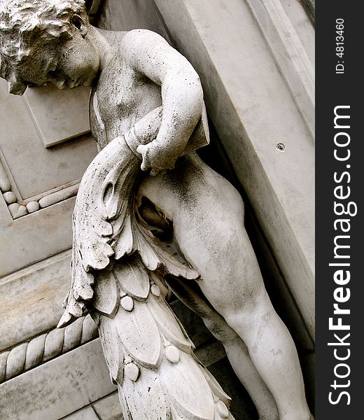 Detail of Recoleta Cemetery, Buenos Aires, Argentina.
The image shows a statue of a child. Detail of Recoleta Cemetery, Buenos Aires, Argentina.
The image shows a statue of a child.