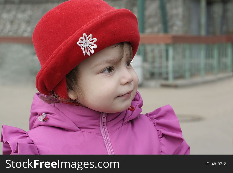 Little girl in red hat