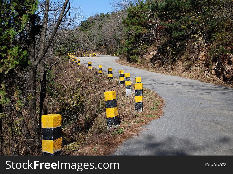 The quiet road to top of the hill.