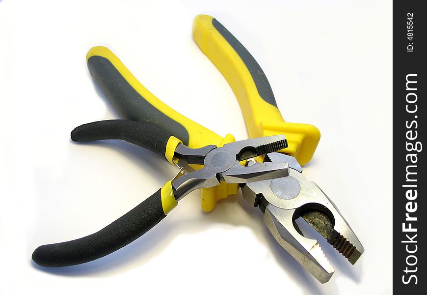 The Big And Small Flat-nose Pliers On A White Back
