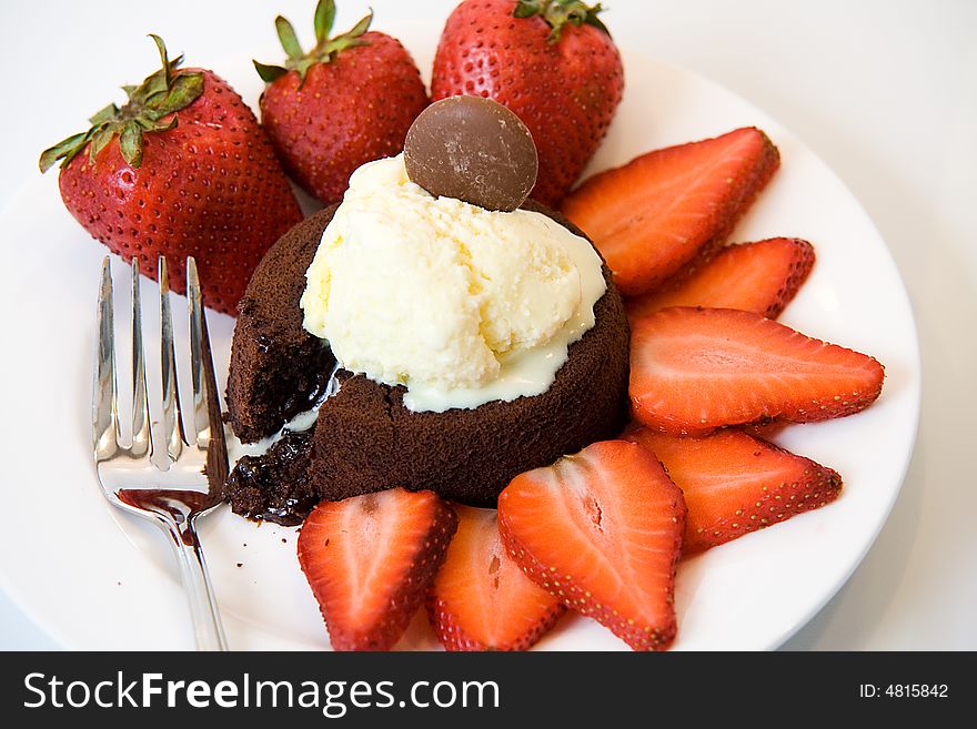 Molten Chocolate Cake with Ice Cream and Strawberries
