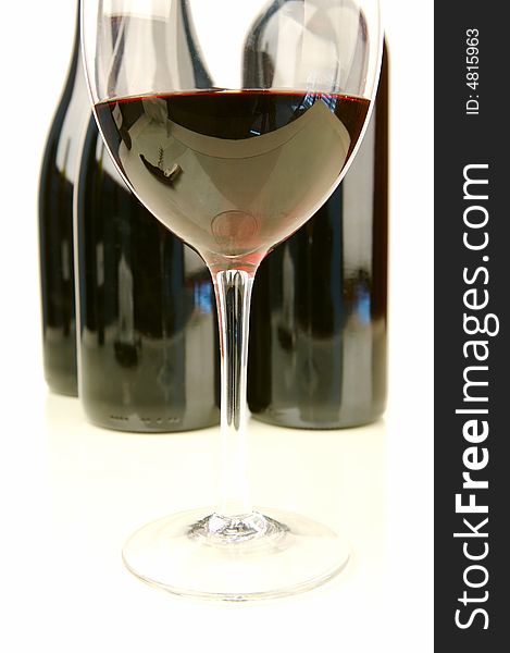 Red and white wine isolated against a white background. Red and white wine isolated against a white background