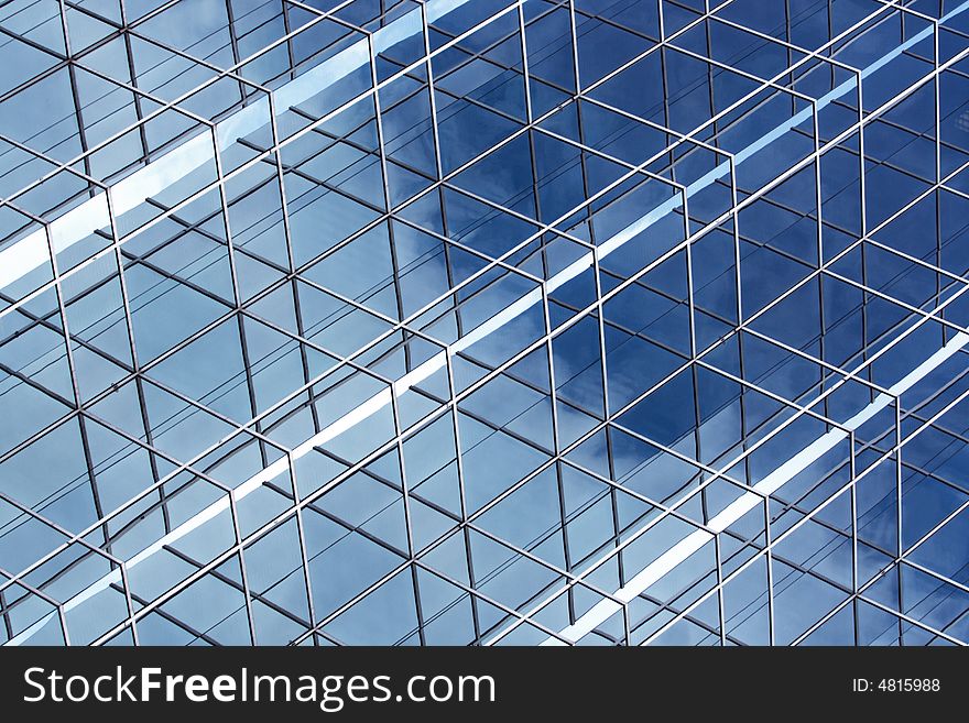 Photo of interesting reflection details in the corner of a steel frame curtain wall structure. Photo of interesting reflection details in the corner of a steel frame curtain wall structure.