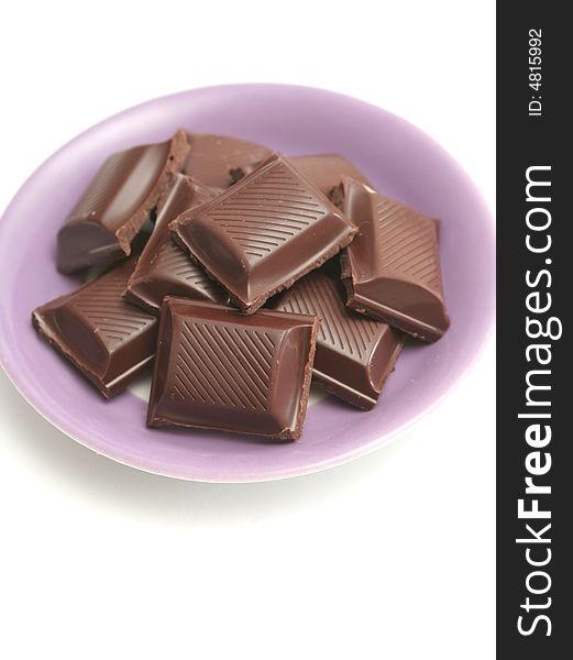 It Is A Lot Of Segments Of Chocolate Lay On A Plat