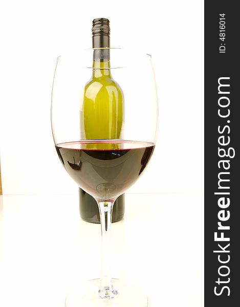 Red and white wine isolated against a white background. Red and white wine isolated against a white background
