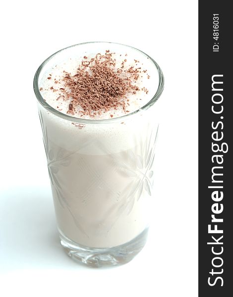 Glass with dairy chocolate drink on a white background