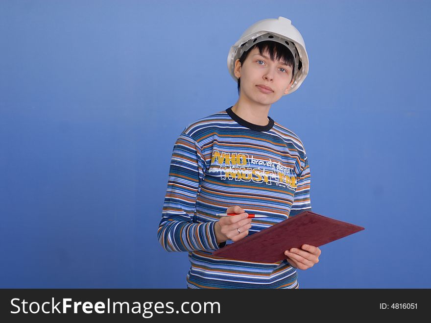 Young Engineer in blue background