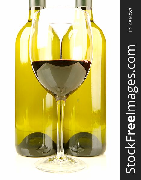 Red and white wine isolated against a white background. Red and white wine isolated against a white background