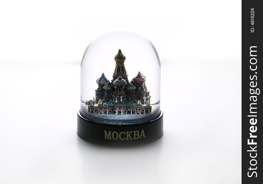 Snow-globe with Moscow St.Basil cathedral, isolated on white