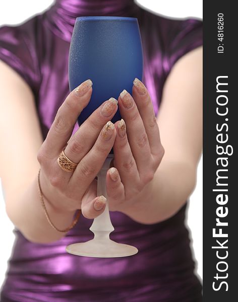 Dark Blue Glass With Wine In Female Hands