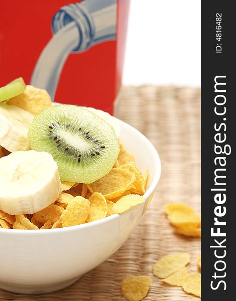 Healthy breakfast.Cornflakes and fruits.