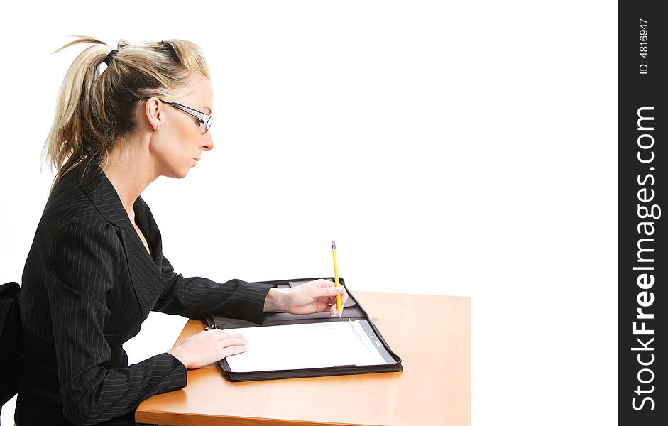 A young attractive business woman in the studio