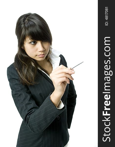 A young business woman writing on backdrop with a stylus pen. A young business woman writing on backdrop with a stylus pen