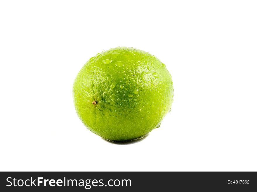 A Lime fruit with water drops isolated on white background