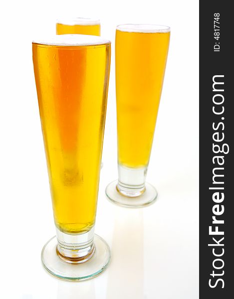 Ice cold beers isolated against a white background