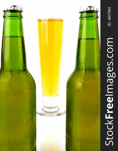 Ice cold beers isolated against a white background