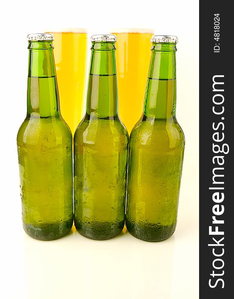 Ice cold beers isolated against a white background