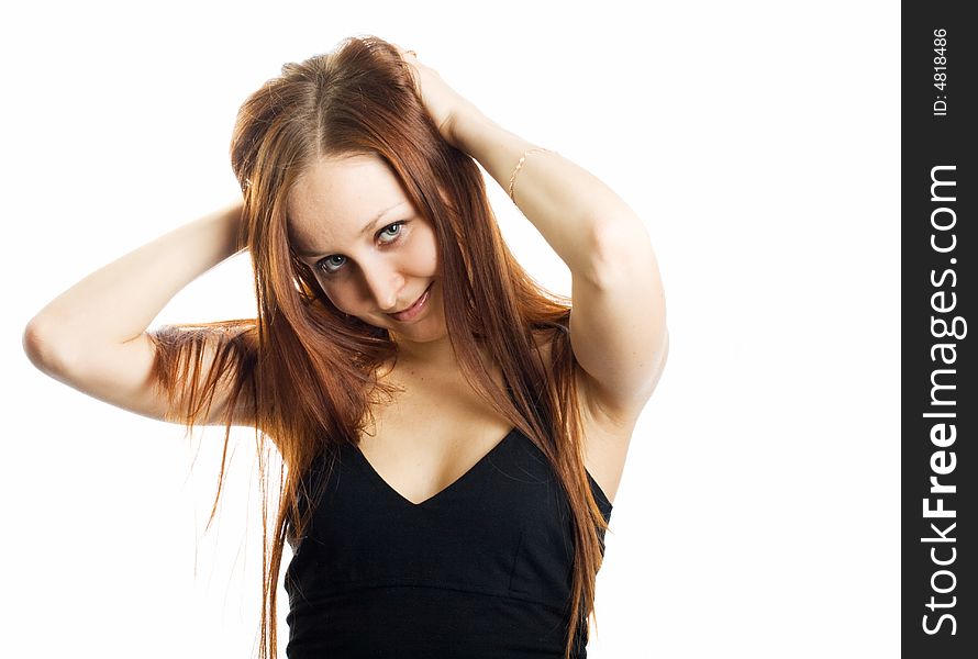 Young girl with long red hairs. Isolated.