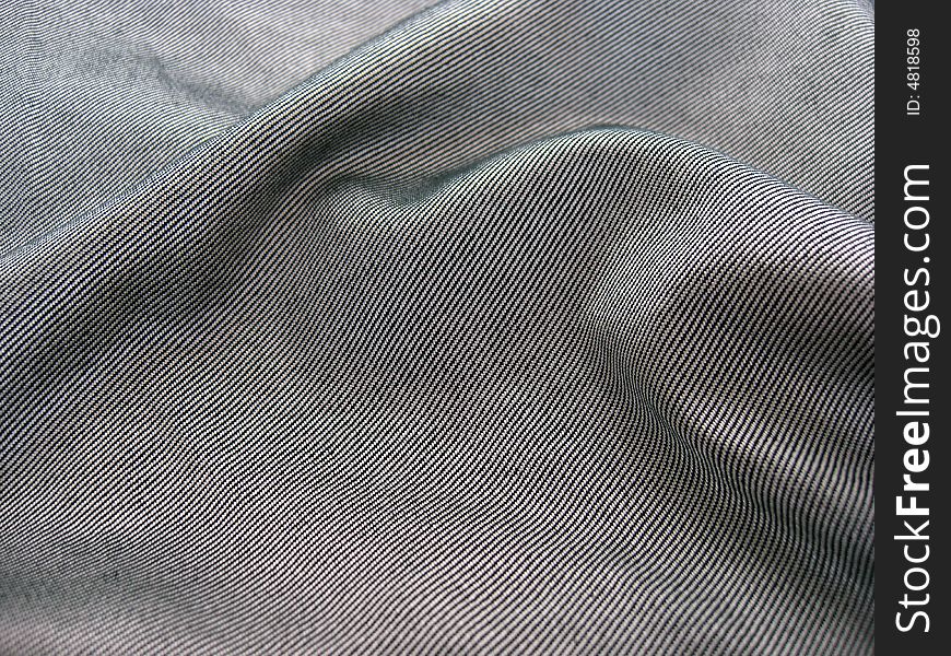 Gray denim texture with some folds