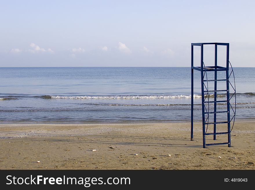 View of an empty beach and lifeguard tower on the Adriatic