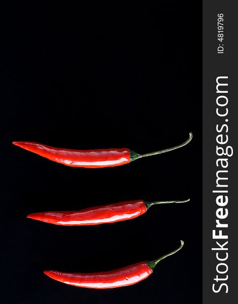 Three Chili Peppers