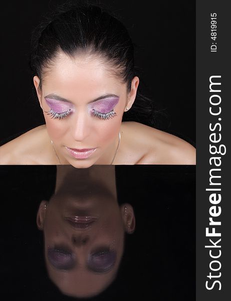 Close-up of a women wearing sohisticated make-up. Close-up of a women wearing sohisticated make-up