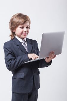 Young Man In Shirt And Tie With A Laptop Stock Photo