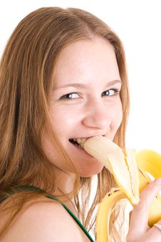 The Young Attractive Girl With A Banana Isolated Stock Photography