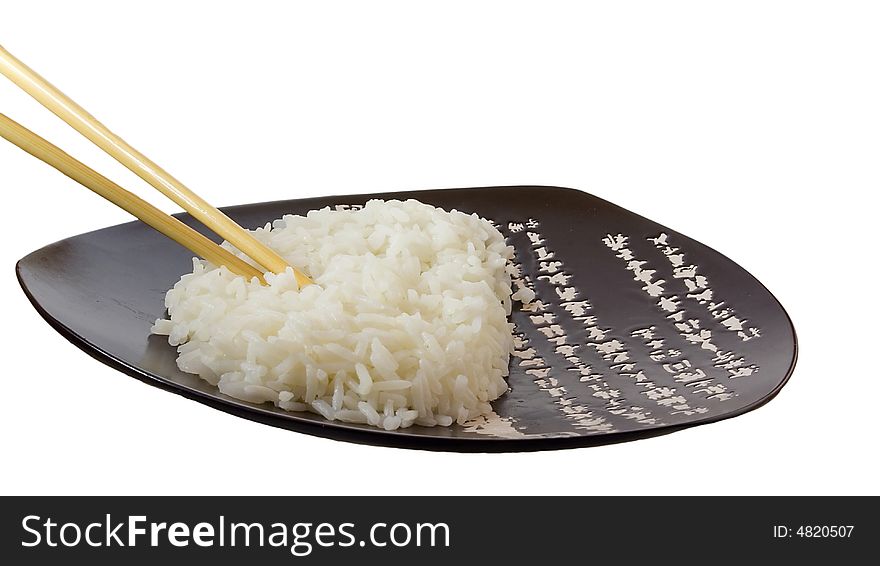 Isolated rice on the plate with hieroglyphes. Isolated rice on the plate with hieroglyphes