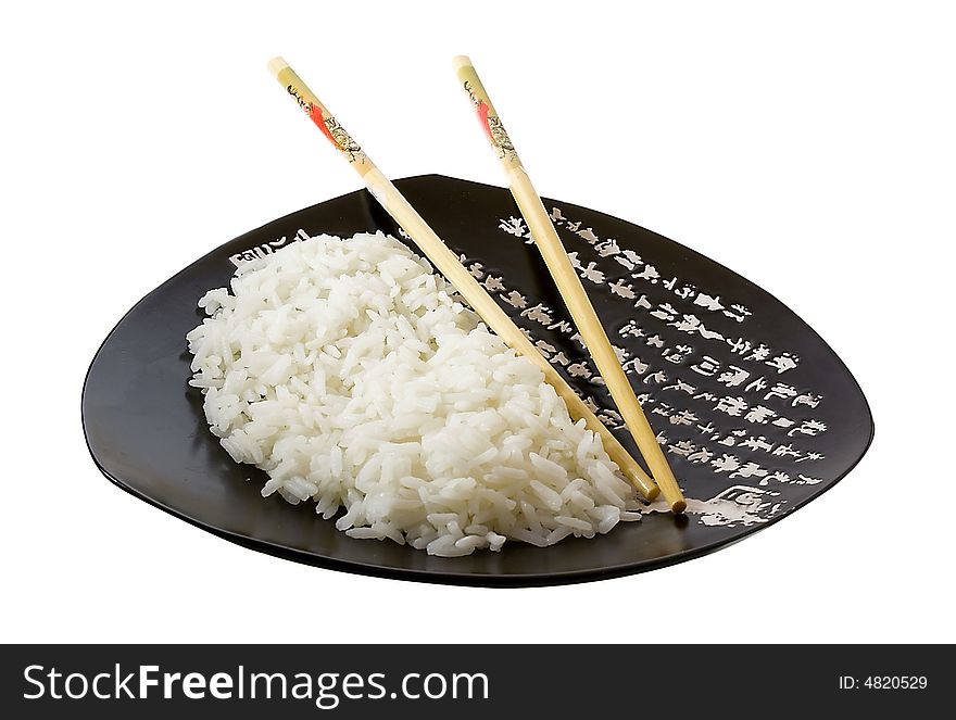 Isolated rice on the plate with hieroglyphes. Isolated rice on the plate with hieroglyphes