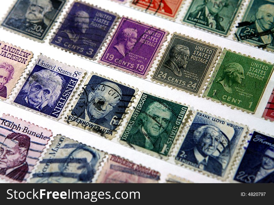 Various postage stamps in an album commemorating some great American personalities. Various postage stamps in an album commemorating some great American personalities