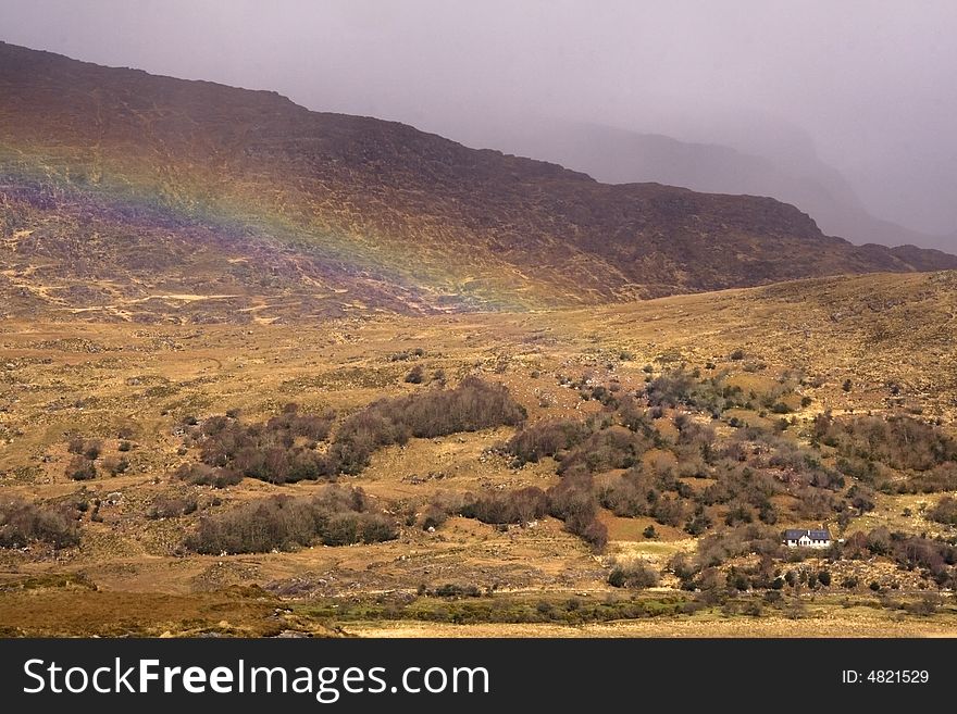 Rainbow over the mountains in Killarney National Park, County Kerry, Ireland. Rainbow over the mountains in Killarney National Park, County Kerry, Ireland