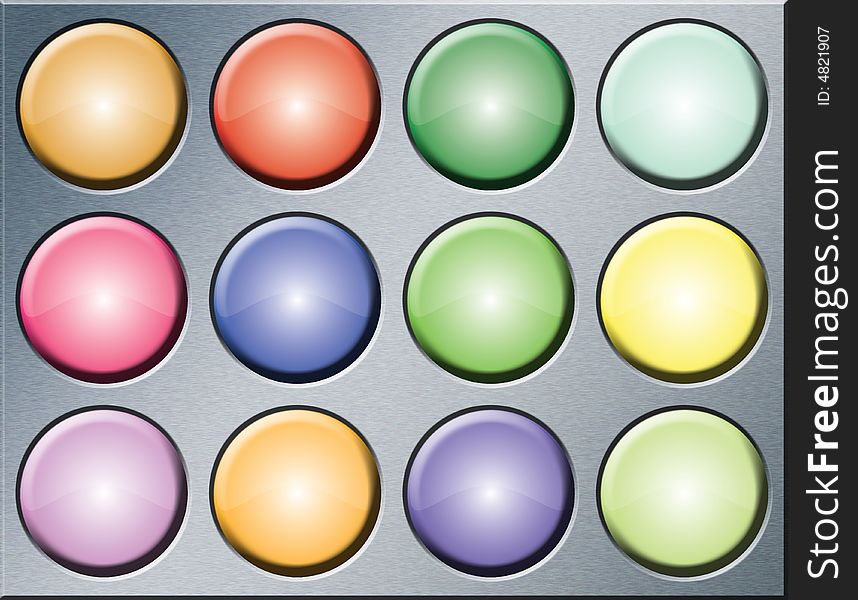 Various blank glazed buttons on a brushed metal background. Various blank glazed buttons on a brushed metal background