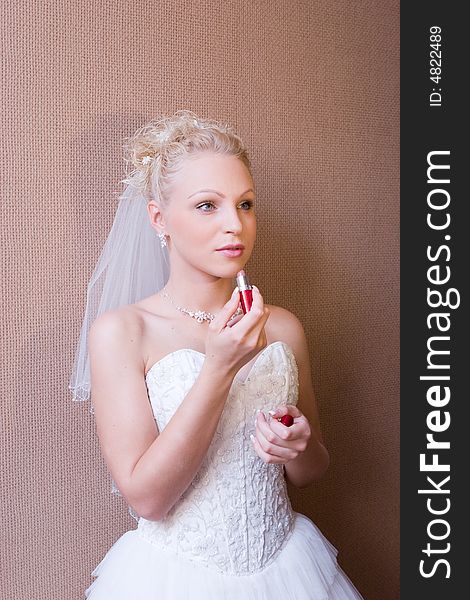 Blond bride with a lipstick. Blond bride with a lipstick