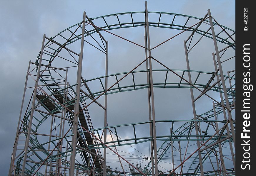 Roller coaster with dark grey background sky