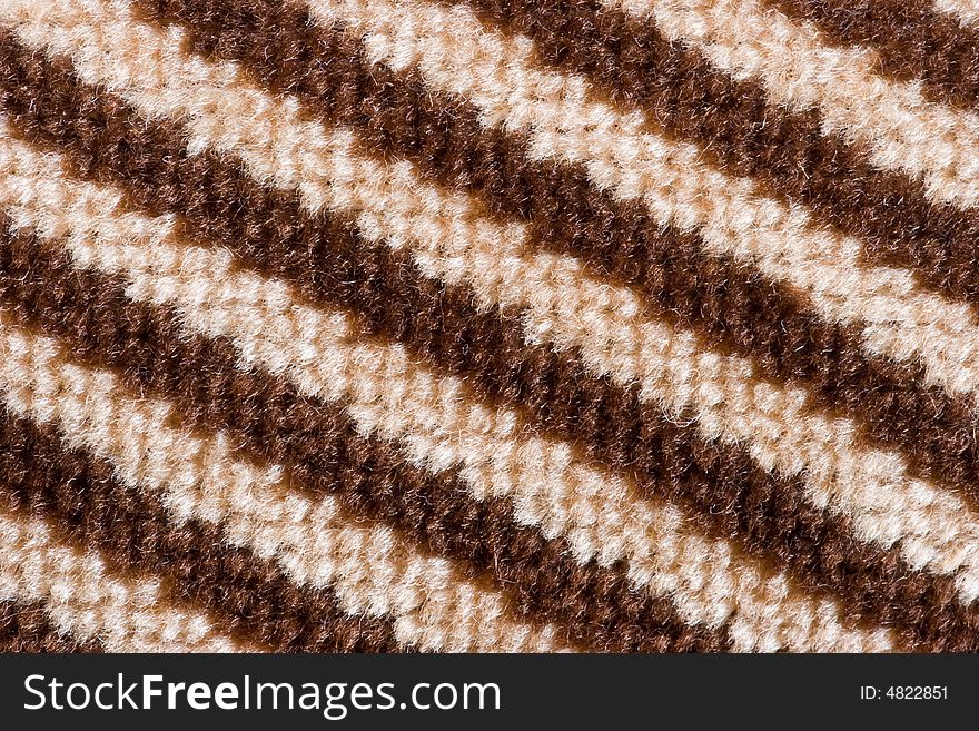 Brown striped fabric pattern close-up